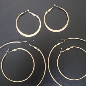 Various sizes of gold hoops